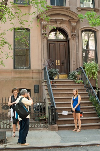 A nice father-daughter moment in front of Carrie Bradshaw's stoop