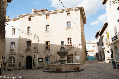 18th-century fountain sits in the center square